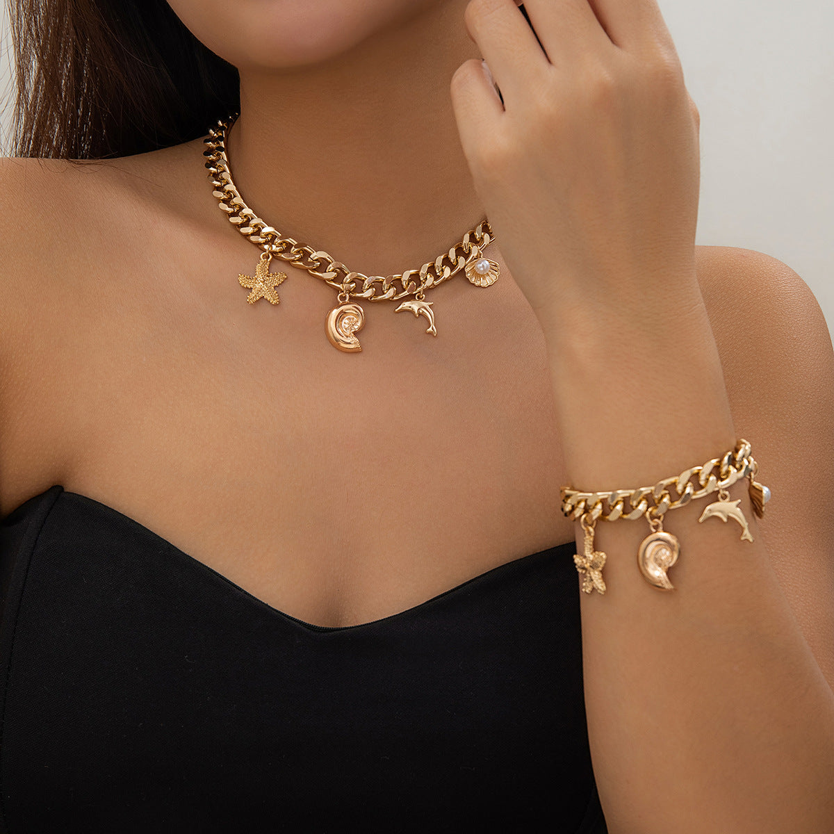 Ocean Boho Charm – Dolphin, Starfish & Shell Pendant Set (Choker & Bracelet) - ZENTRION