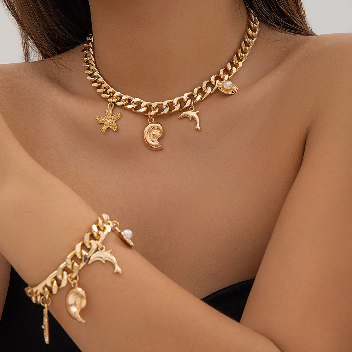 Ocean Boho Charm – Dolphin, Starfish & Shell Pendant Set (Choker & Bracelet) - ZENTRION